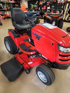 A red 2022 Broadmoor 25 H.P. sit on lawn mower.