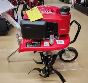 A red Honda F220 tiller.
