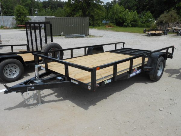 A Sure Trac Trailer 6 x 10 tube top utility trailer.