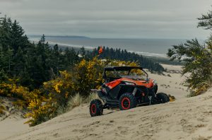 cf moto vehicle in sand